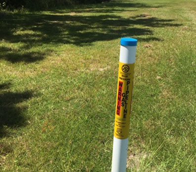 Pipeline warning pole.